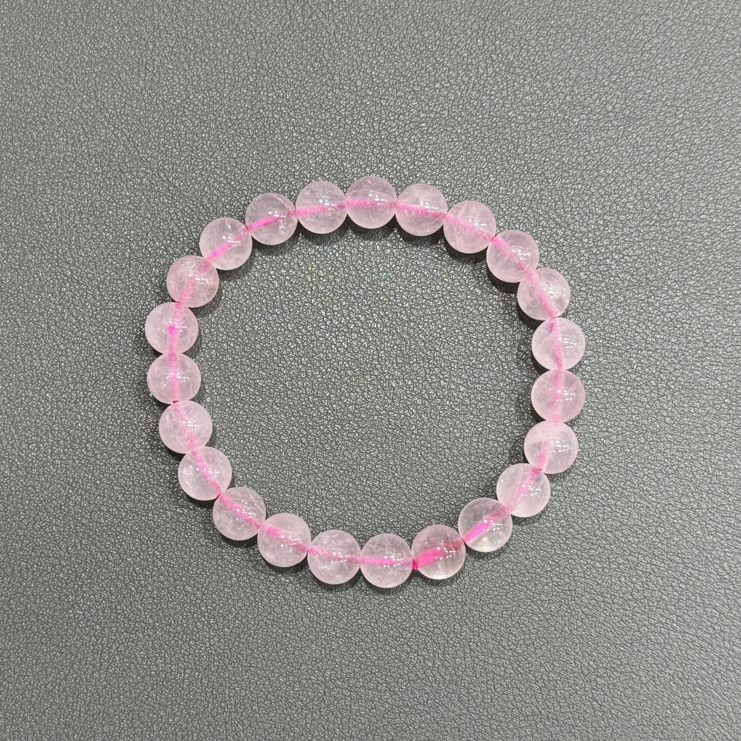 Natural rose quartz bracelet 8mm in size weighing approximately 20 grams. - Image 2