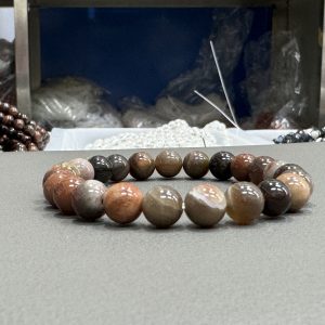 Natural petrified wood bracelet 8mm in size weighing approximately 20 grams
