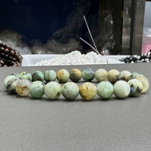 Natural phoenix lapis bracelet 8mm in size weighing approximately 20 grams