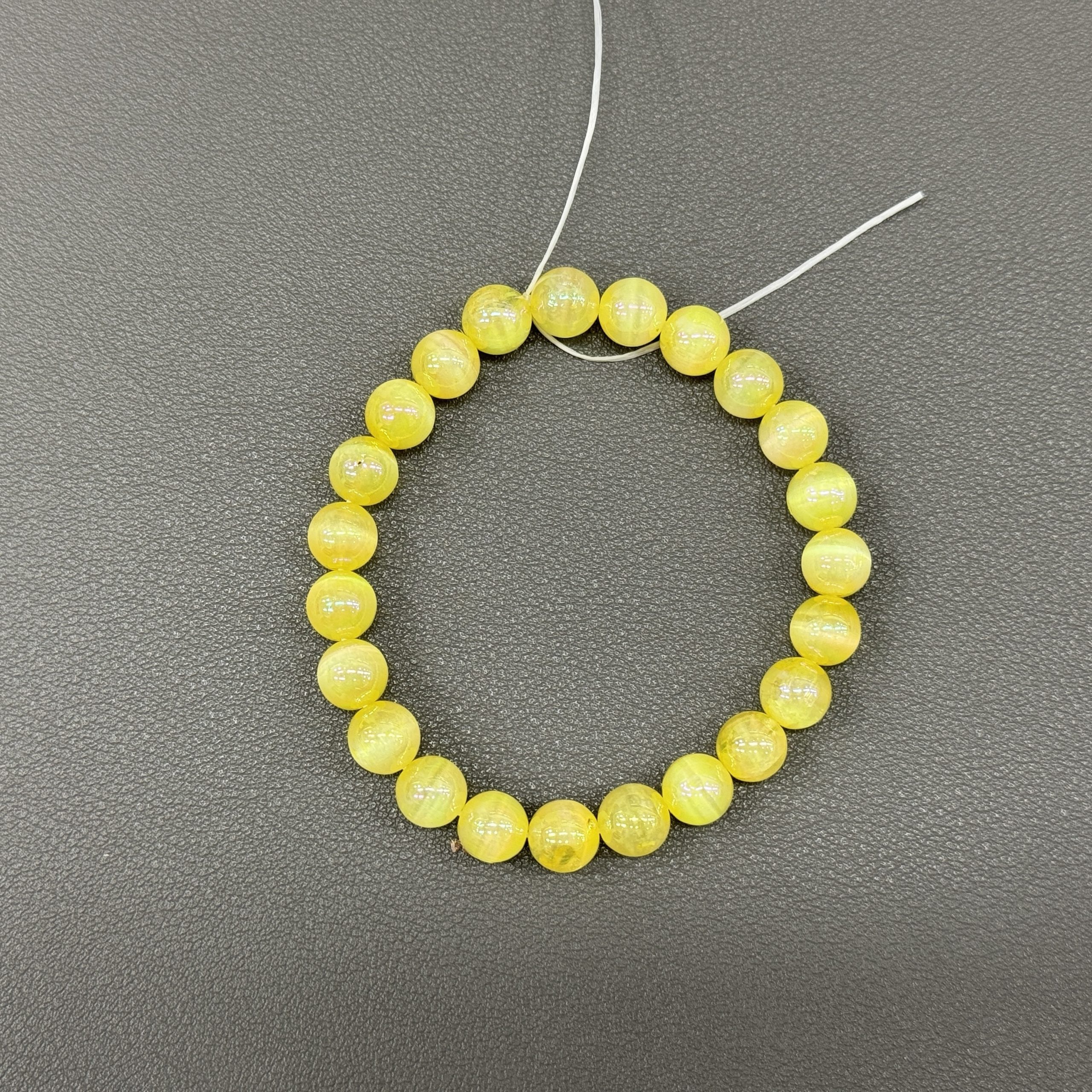 Yellow Cat’s eyes bracelet 8mm in size weighing approximately 20 grams - Image 2