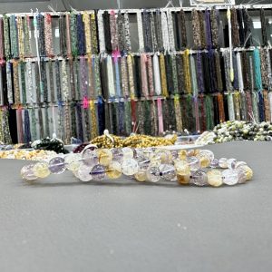 Amethyst and citrine bracelet 8mm in size weighing approximately 20 grams